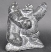 20TH CENTURY PETER NOWRA CARVED INUIT SCULPTURE