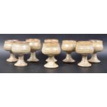 MATCHING SET OF EIGHT STUDIO ART POTTERY GOBLETS