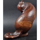 CONTEMPORARY CARVED STAINED WALNUT SCULPTURE