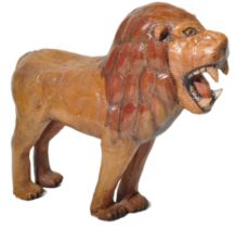 LARGE EARLY 20TH CENTURY PAPIER MACHE LION SCULPTURE