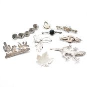 GROUP OF SILVER BROOCH PINS