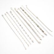 GROUP OF SILVER CHAIN BRACELETS