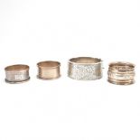 THREE SILVER NAPKIN RINGS & BANGLE BRACELET