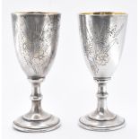 PAIR OF ANTIQUE RUSSIAN SILVER VODKA CUPS