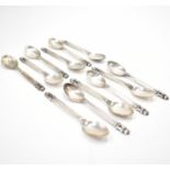 TWELVE EARLY 20TH CENTURY GEORG JENSEN TEASPOONS