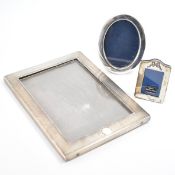 COLLECTION OF SILVER FRONTED PHOTO FRAMES