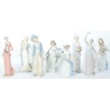 AN ASSORTMENT OF EIGHT 20TH CENTURY NAO BY LLADRO FIGURES