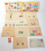 A COLLECTION OF STAMPS FROM CHINA AND HONG KONG