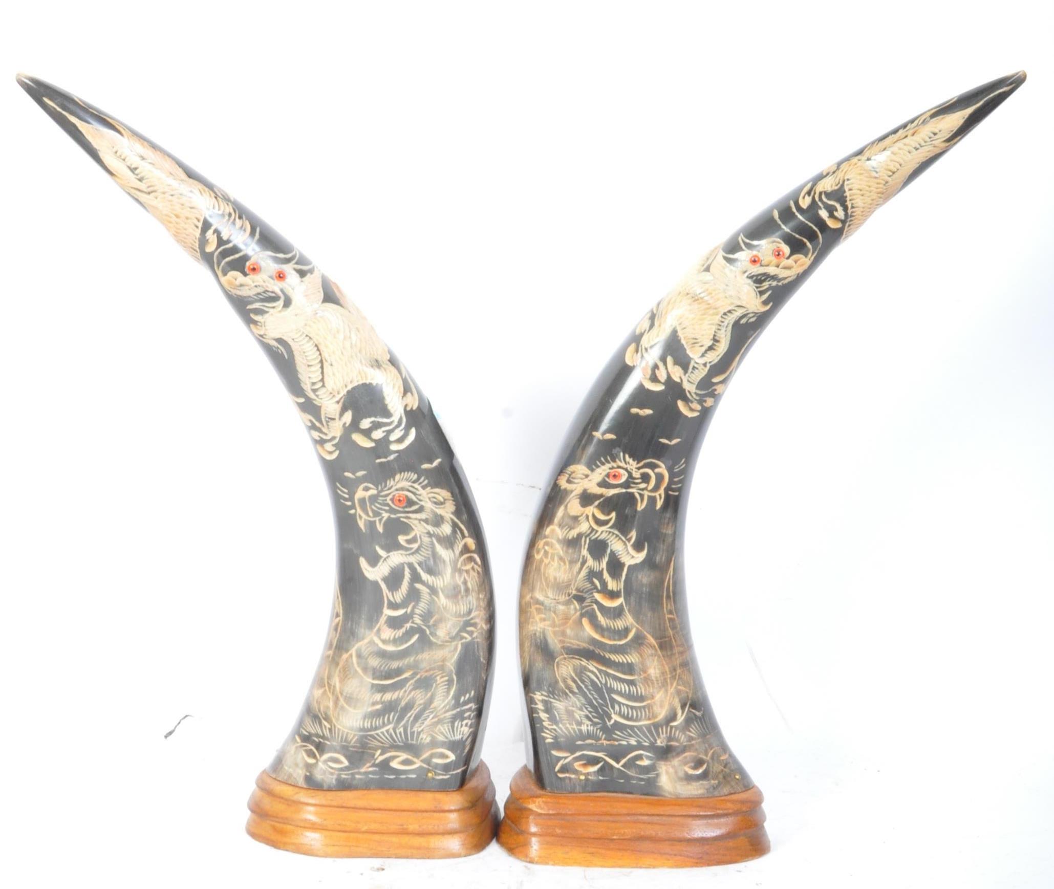 PAIR OF VINTAGE EBONISED & HAND PAINTED FAUX BUFFALO HORNS