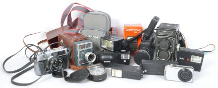 A COLLECTION OF CAMERA AND VIDEO EQUIPMENT