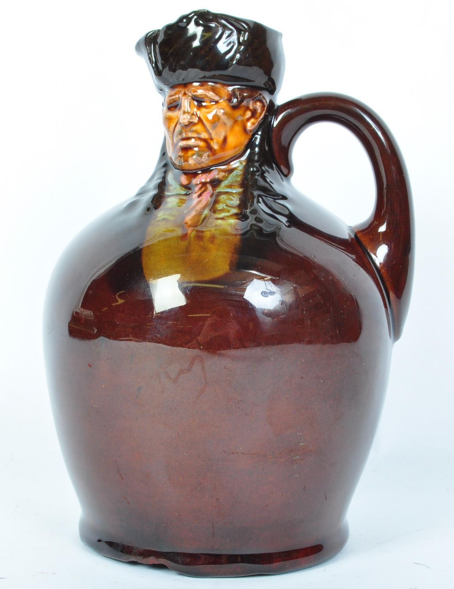 AN EARLY 20TH CENTURY ROYAL DOULTON KINGSWARE BILL SYKES WHISKEY FLAGON