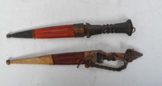 A VINTAGE PAIR OF AFRICAN TRIBAL DAGGERS