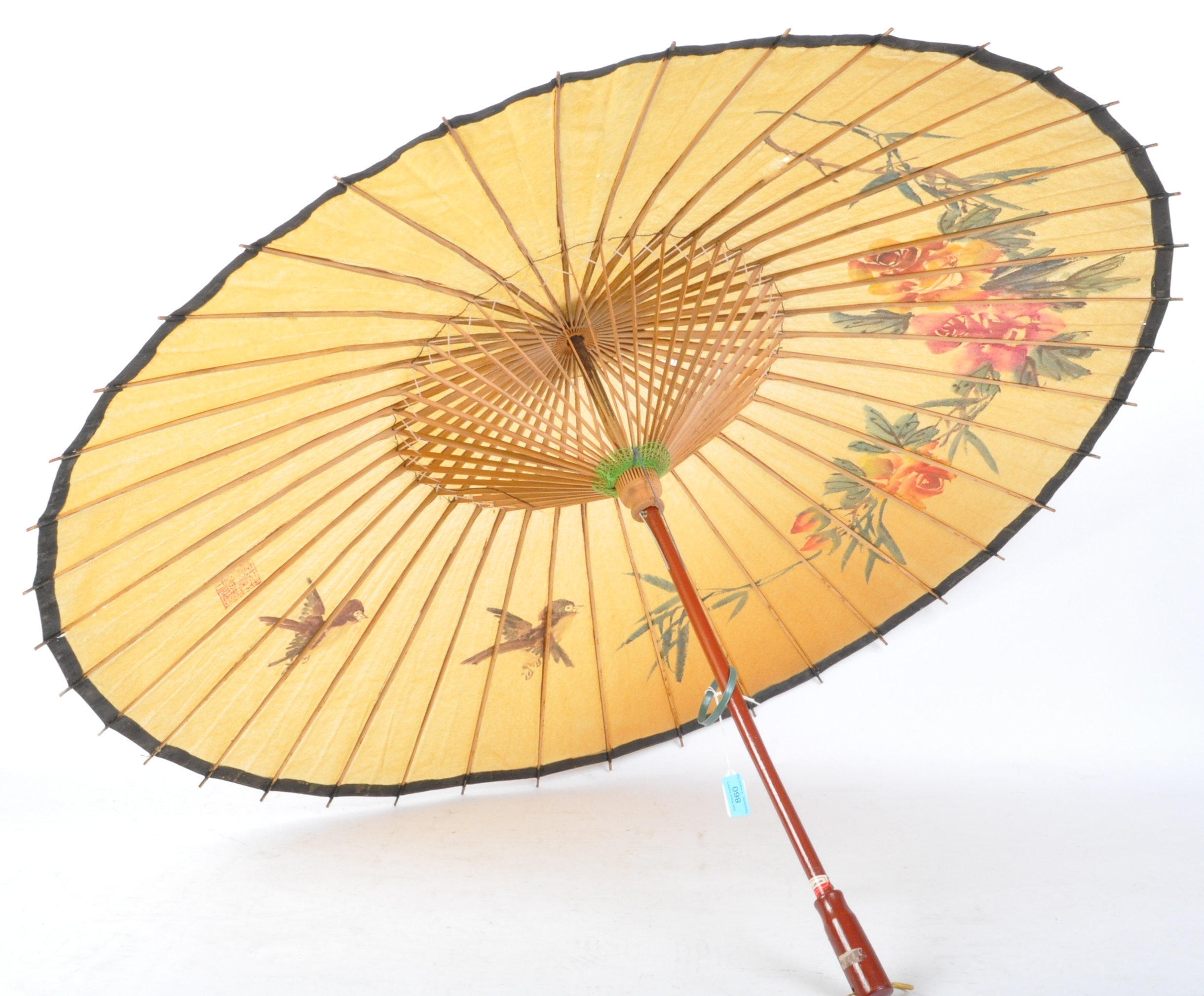 A WOODEN ORIENTAL CHINESE PARASOL