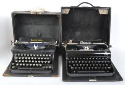 TWO VINTAGE CASED TYPEWRITERS - OLYMPIA & BLUE BIRD