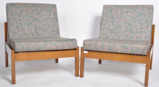 MATCHING PAIR OF MID CENTURY STAINED BEECH EASY CHAIRS