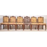 A SET OF SIX VINTAGE OAK DINING CHAIRS