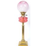 19TH CENTURY BRASS & CRANBERRY GLASS OIL LAMP