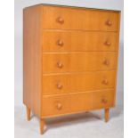 A RETRO MID 20TH CENTURY TEAK WOOD CHEST OF DRAWERS