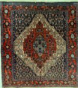 AN EARLY 20TH CENTURY KURDISH ISLAMIC SENNEH FLOOR CARPET RUG