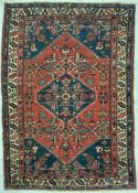 AN EARLY 20TH CENTURY PERSIAN ISLAMIC HERIZ FLOOR CARPET RUG