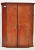 GEORGE III EARLY 19TH CENTURY OAK CORNER CABINET