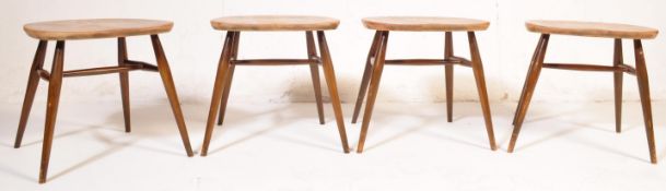 SET OF FOUR VINTAGE ELM ERCOL SADDLE STOOLS