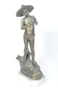 AFTER GIOVANNI VARLESE - A VINTAGE SPELTER STATUE OF FISHING BOY