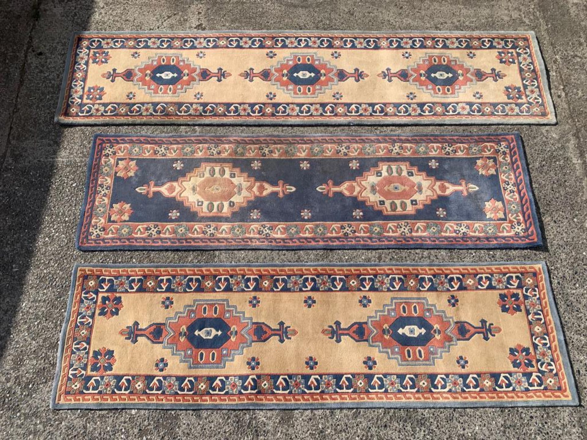 THREE 20TH CENTURY CHINESE ORIENTAL STYLE RUNNER RUGS