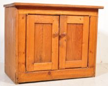 A VINTAGE 20TH CENTURY PINE CUPBOARD