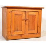 A VINTAGE 20TH CENTURY PINE CUPBOARD