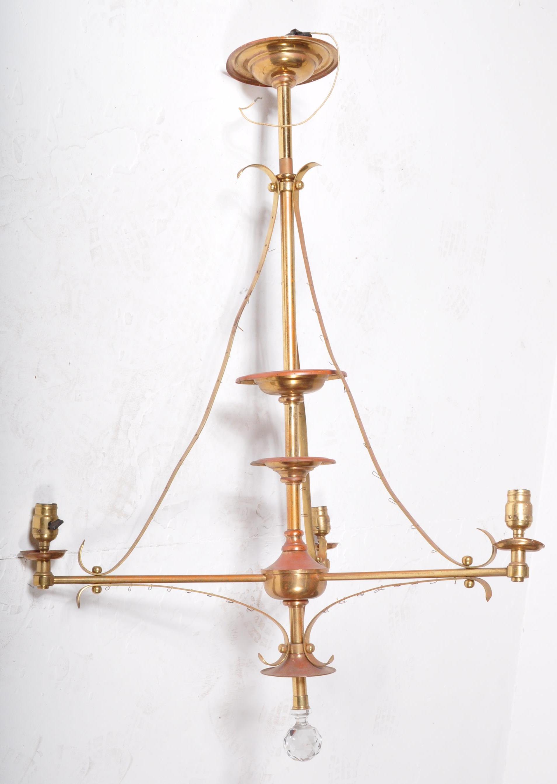 AN EARLY 20TH CENTURY TALL BRASS TIERED CEILING LIGHT - Image 6 of 6