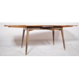 A MID 20TH CENTURY EBONISED TEAK & LAMINATE ITALIAN DINING TABLE