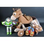 A COLLECTION OF TOY STORY MERCHANDISE