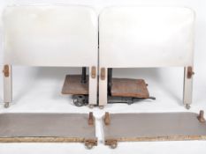 P. B. COW & COMPANY LTD - AVIATION - ALUMINIUM-CLAD PAIR OF BEDS