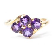 HALLMARKED 9CT GOLD & PURPLE STONE CROSSOVER RING