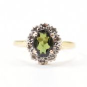 HALLMARKED 18CT GOLD GREEN STONE & DIAMOND HALO RING