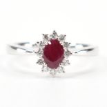 950 PLATINUM RUBY & DIAMOND HALO RING