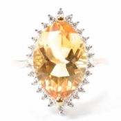 HALLMARKED 9CT GOLD DIAMOND & YELLOW STONE HALO RING