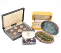 COLLECTION OF ANTIQUE DRESS BUTTONS & GARRARD & CO BOX