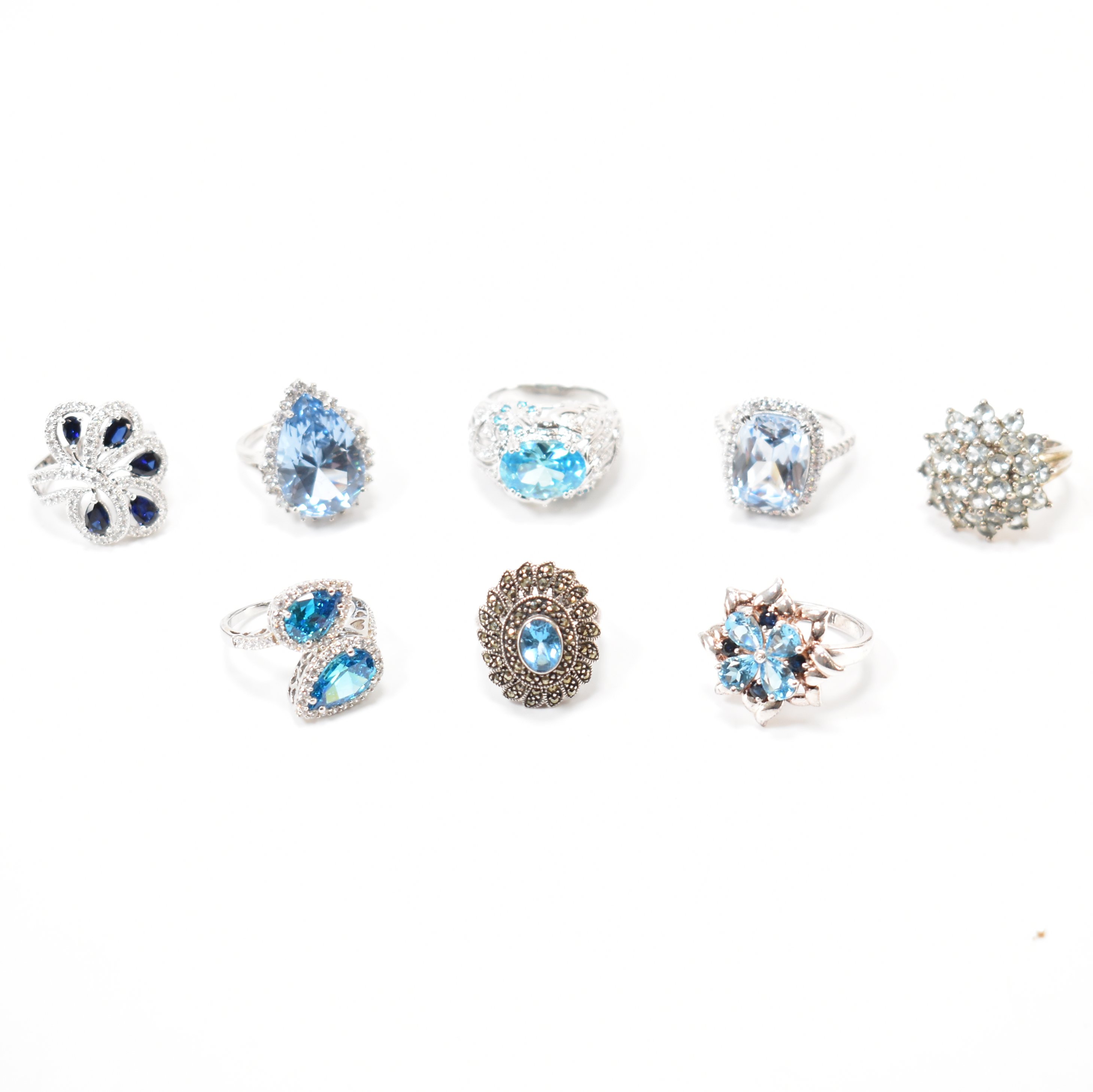 GROUP OF 925 SILVER BLUE STONE SET RINGS