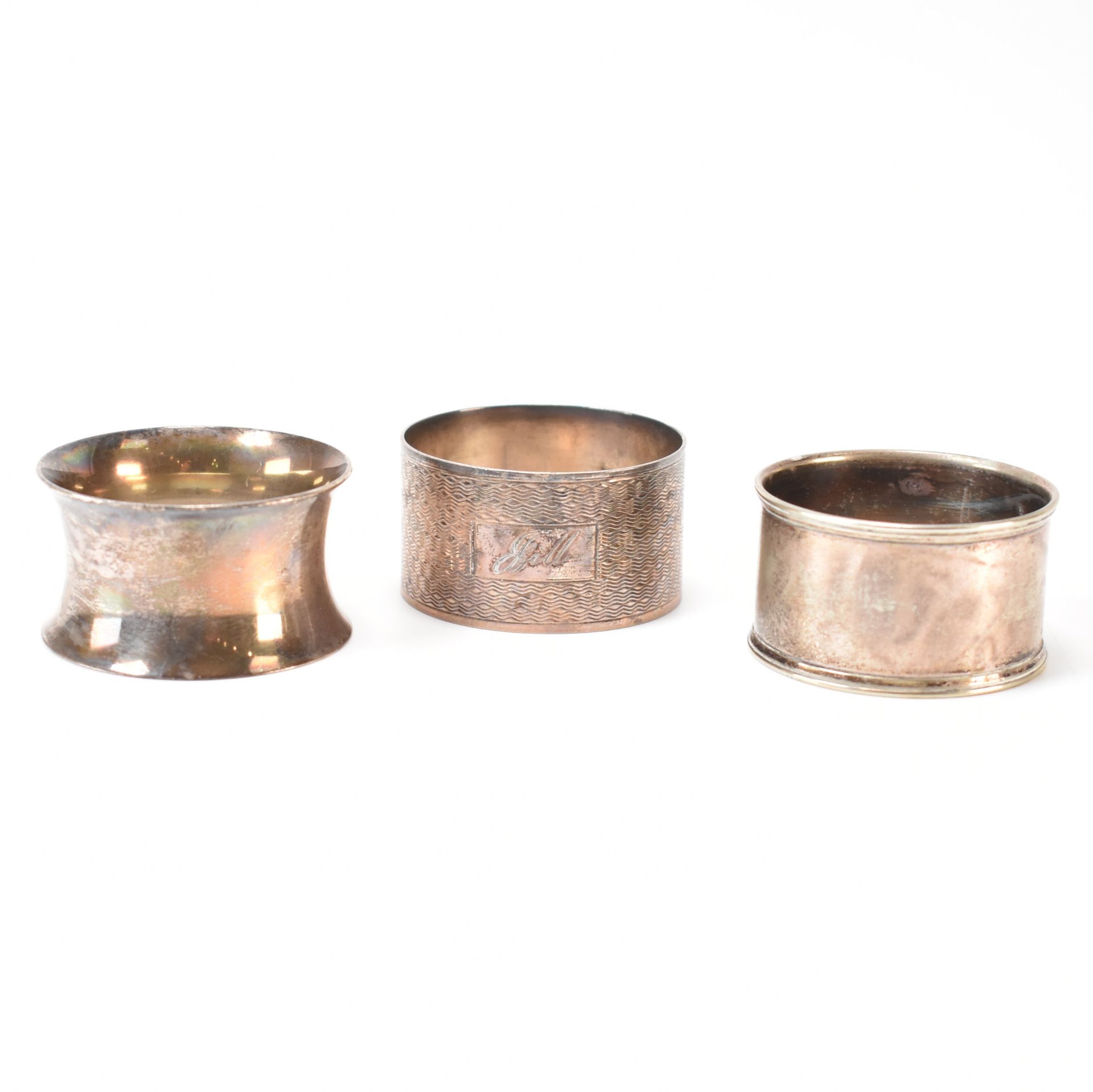 TWO SILVER HALLMARKED NAPKIN RINGS & ANOTHER