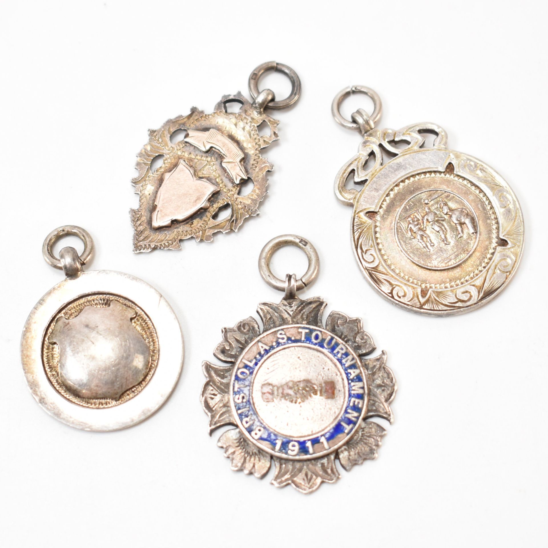 FOUR ANTIQUE SILVER HALLMARKED FOB MEDALS
