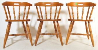 FOUR MID CENTURY BEECH & ELM CAPTAINS DINING CHAIRS