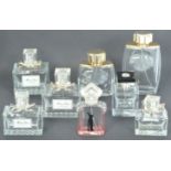 A COLLECTION OF LALIQUE BRANDED PERFUME BOTTLES