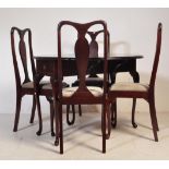 20TH CENTURY QUEEN ANNE REVIVAL AFRICAN MAHOGANY DINING TABLE & CHAIRS