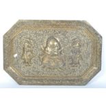AN INDIAN EMBOSSED BRASS WALL HANGING / TRAY