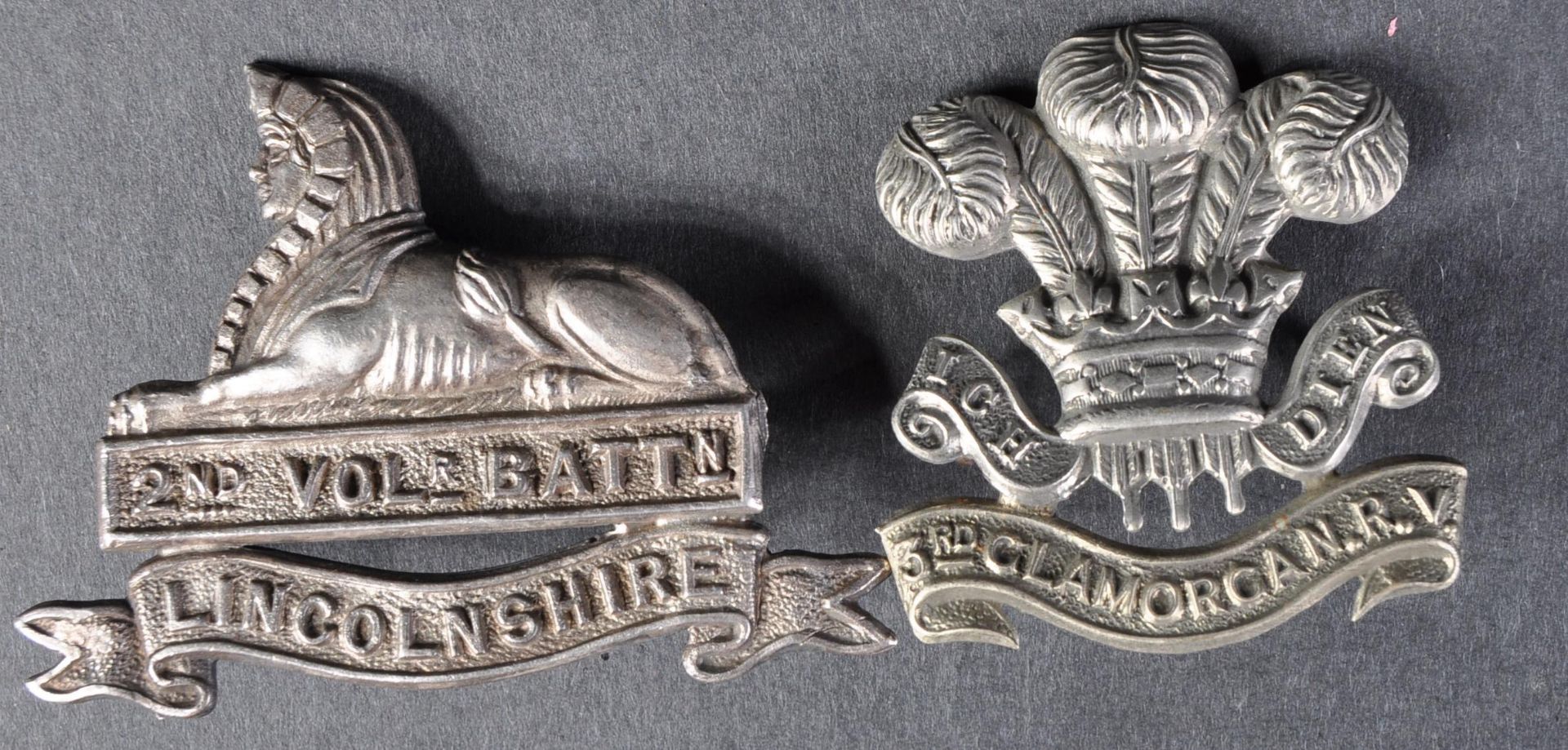 TWO BRITISH MILITARY CAP BADGES