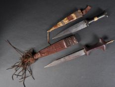 TWO 19TH CENTURY NORTH AFRICAN TRIBAL DAGGERS
