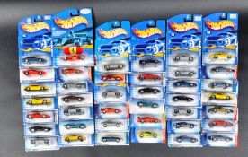 A LARGE COLLECTION OF APPROXIMATELY X40 CARDED MATTEL MADE FERRARI HOT WHEELS