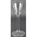 18TH CENTURY PLAIN STEM WINE DRINKING GLASS.